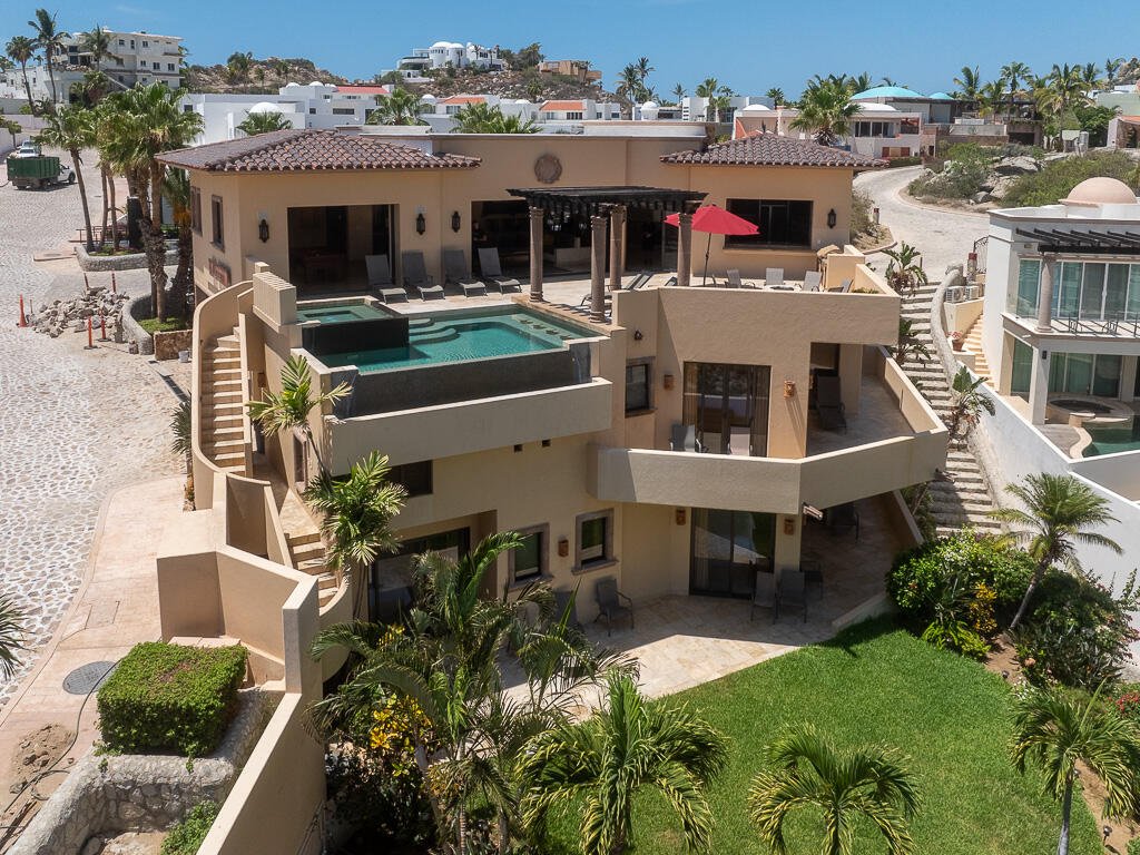 Cabo San Lucas Pedregal Csl Casa Agave presents a rare invitation to experience the raw beauty and vibrant life of the Pacific Ocean from a residence of contemporary distinction. Designed for those who seek both serene sanctuary and moments of shared delight, this seven-bedroom oceanfront home offers an unparalleled connection to the stunning Los Cabos coast.Imagine waking to the sound of waves, the horizon a canvas for breathtaking sunrises. At Casa Agave, the expansive living spaces seamlessly merge with the coastal landscape, offering uninterrupted for sale