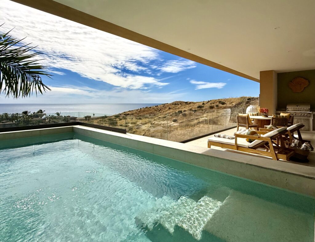 Cabo San Lucas Pedregal Csl Casa LA PIÑATA A luxury villa located in the exclusive Pedregal Cabo San Lucas. Perfect as a private residence or a high-end vacation rental, this villa offers an exceptional combination of comfort, style, privacy, and location.The villa features 8 bedrooms including a service room (as an independent apartment suite), 8.5 bathrooms, and 13 beds.Fully furnished and equipped with top-quality finishes, providing a turnkey experience.Every detail has been thoughtfully crafted to create an exceptional space for family gatherings and entertaining. The expansive terrace includes a great swimming pool, 2 jacuzzi, bar, 2 BBQ station, 2 fire pits, and multiple lounge areas, to enjoy the very best of Cabo living The interiors feature cozy and elegant living spaces, including a inside bar, games room, media room and impeccable design in every corner Fully furnished and equipped, representing an outstanding opportunity. With its exceptional design, amenities, and location, this villa embodies the best of the Baja lifestyle – Calle Paseo Colinas, Cabo San Lucas, BS