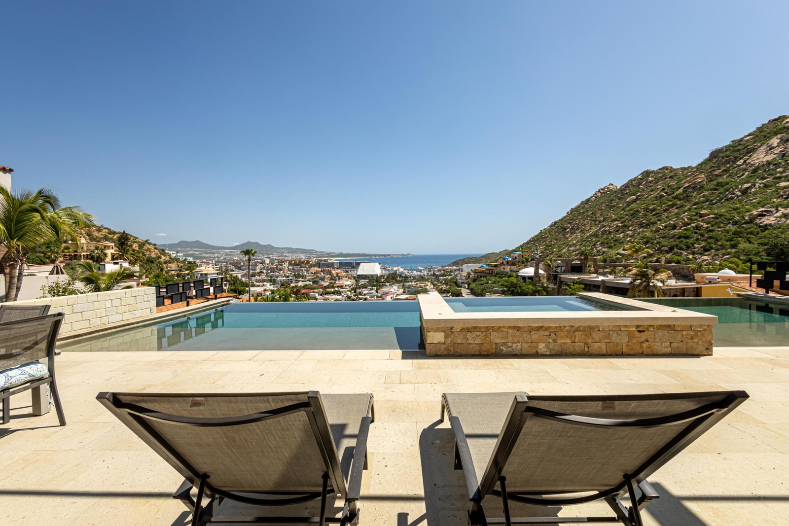 Cabo San Lucas Pedregal Csl Casa LA PIรATA A luxury villa located in the exclusive Pedregal Cabo San Lucas. Perfect as a private residence or a high-end vacation rental, this villa offers an exceptional combination of comfort, style, privacy, and location.The villa features 8 bedrooms including a service room (as an independent apartment suite), 8.5 bathrooms, and 13 beds.Fully furnished and equipped with top-quality finishes, providing a turnkey experience.Every detail has been thoughtfully crafted to create an exceptional space for family gatherings and entertaining. The expansive terrace includes a great swimming pool, 2 jacuzzi, bar, 2 BBQ station, 2 fire pits, and multiple lounge areas, to enjoy the very best of Cabo living The interiors feature cozy and elegant living spaces, including a inside bar, games room, media room and impeccable design in every corner Fully furnished and equipped, representing an outstanding opportunity. With its exceptional design, amenities, and location, this villa embodies the best of the Baja lifestyle for sale