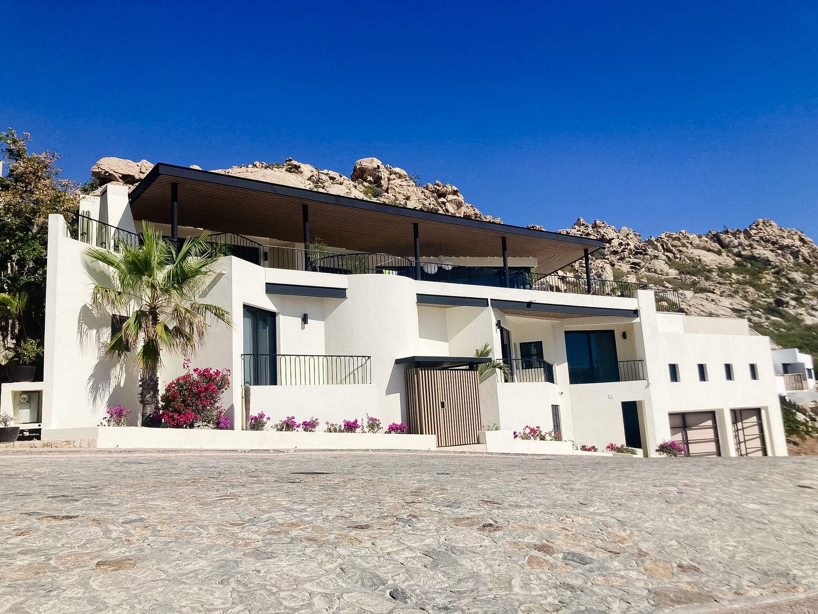 Cabo San Lucas Pedregal Csl Casa Agave presents a rare invitation to experience the raw beauty and vibrant life of the Pacific Ocean from a residence of contemporary distinction. Designed for those who seek both serene sanctuary and moments of shared delight, this seven-bedroom oceanfront home offers an unparalleled connection to the stunning Los Cabos coast.Imagine waking to the sound of waves, the horizon a canvas for breathtaking sunrises. At Casa Agave, the expansive living spaces seamlessly merge with the coastal landscape, offering uninterrupted for sale