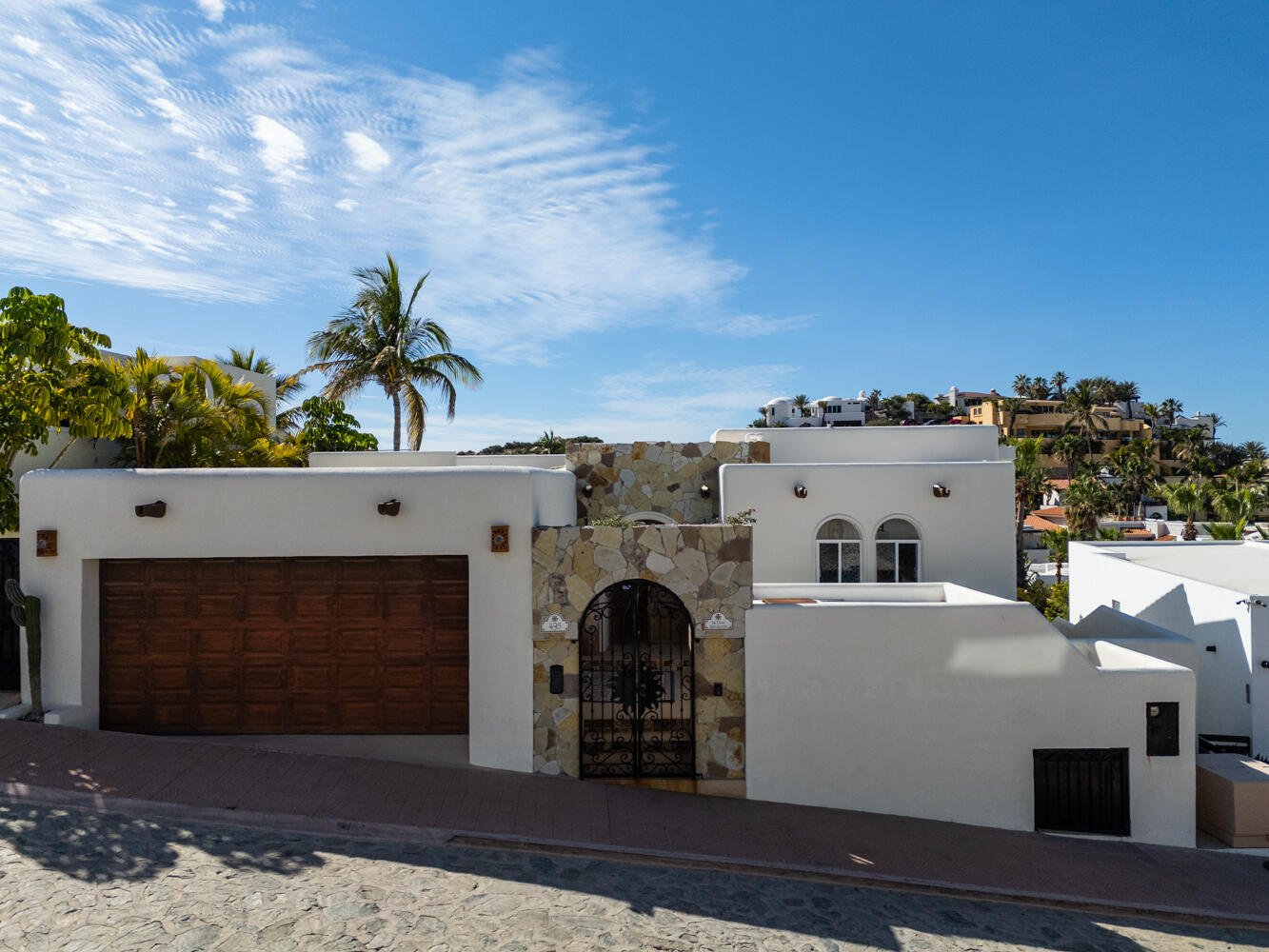 Cabo San Lucas Pedregal Csl Casa LA PIรATA A luxury villa located in the exclusive Pedregal Cabo San Lucas. Perfect as a private residence or a high-end vacation rental, this villa offers an exceptional combination of comfort, style, privacy, and location.The villa features 8 bedrooms including a service room (as an independent apartment suite), 8.5 bathrooms, and 13 beds.Fully furnished and equipped with top-quality finishes, providing a turnkey experience.Every detail has been thoughtfully crafted to create an exceptional space for family gatherings and entertaining. The expansive terrace includes a great swimming pool, 2 jacuzzi, bar, 2 BBQ station, 2 fire pits, and multiple lounge areas, to enjoy the very best of Cabo living The interiors feature cozy and elegant living spaces, including a inside bar, games room, media room and impeccable design in every corner Fully furnished and equipped, representing an outstanding opportunity. With its exceptional design, amenities, and location, this villa embodies the best of the Baja lifestyle for sale