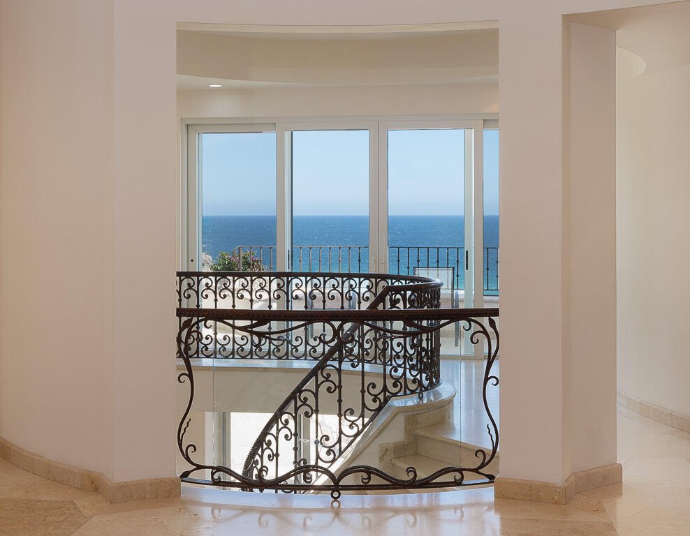 Cabo San Lucas Pedregal Csl Casa Agave presents a rare invitation to experience the raw beauty and vibrant life of the Pacific Ocean from a residence of contemporary distinction. Designed for those who seek both serene sanctuary and moments of shared delight, this seven-bedroom oceanfront home offers an unparalleled connection to the stunning Los Cabos coast.Imagine waking to the sound of waves, the horizon a canvas for breathtaking sunrises. At Casa Agave, the expansive living spaces seamlessly merge with the coastal landscape, offering uninterrupted for sale