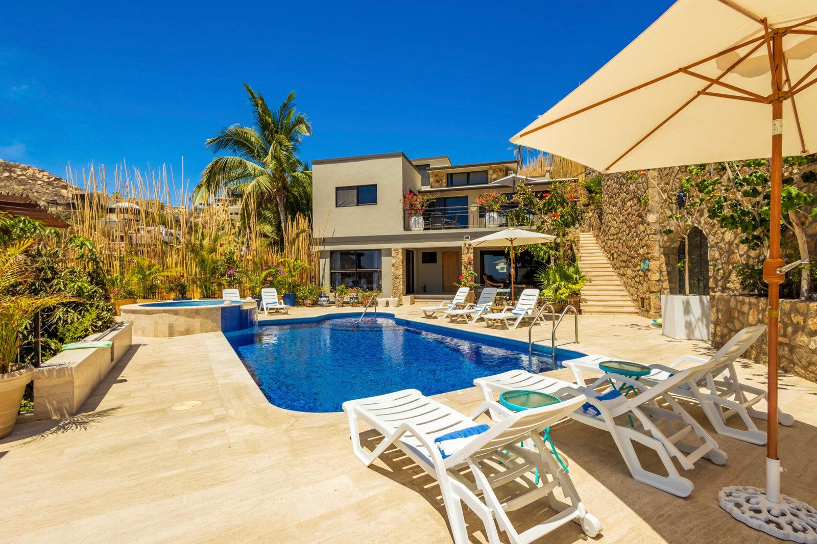 Cabo San Lucas Pedregal Csl Casa LA PIรATA A luxury villa located in the exclusive Pedregal Cabo San Lucas. Perfect as a private residence or a high-end vacation rental, this villa offers an exceptional combination of comfort, style, privacy, and location.The villa features 8 bedrooms including a service room (as an independent apartment suite), 8.5 bathrooms, and 13 beds.Fully furnished and equipped with top-quality finishes, providing a turnkey experience.Every detail has been thoughtfully crafted to create an exceptional space for family gatherings and entertaining. The expansive terrace includes a great swimming pool, 2 jacuzzi, bar, 2 BBQ station, 2 fire pits, and multiple lounge areas, to enjoy the very best of Cabo living The interiors feature cozy and elegant living spaces, including a inside bar, games room, media room and impeccable design in every corner Fully furnished and equipped, representing an outstanding opportunity. With its exceptional design, amenities, and location, this villa embodies the best of the Baja lifestyle for sale