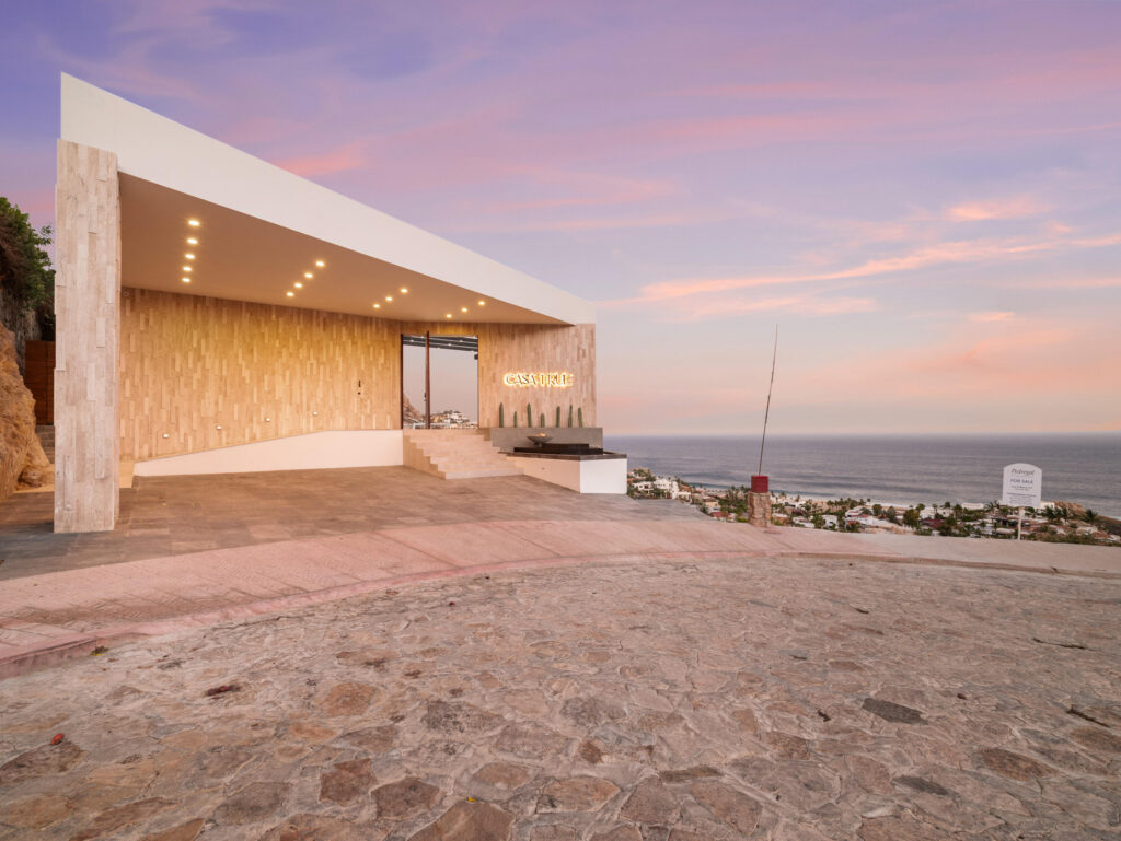 Cabo San Lucas Pedregal Csl Where the Pacific Becomes Your BackyardSome homes simply house you. This one transforms you.Perched in the coveted enclave of Pedregal -- Cabo San Lucas's most prestigious address -- this five-bedroom, six-and-a-half-bathroom estate is not just a property. It's a declaration. A fully furnished masterpiece where every room was designed with a single purpose: to make you feel like the most important person in the world, because here, you are.Step inside and the ocean doesn't just greet you -- it commands the room. A sweeping open-frame window turns the Sea of Cortez into living art, framed by handcrafted parota wood furniture that brings warmth, soul, and a sense of timeless Mexican craftsmanship to every gathering. Sunsets here aren't something you watch. They're something you host. The smart bedrooms offer panoramic ocean – 450 Cam. Del Sol, Cabo San Lucas, BS